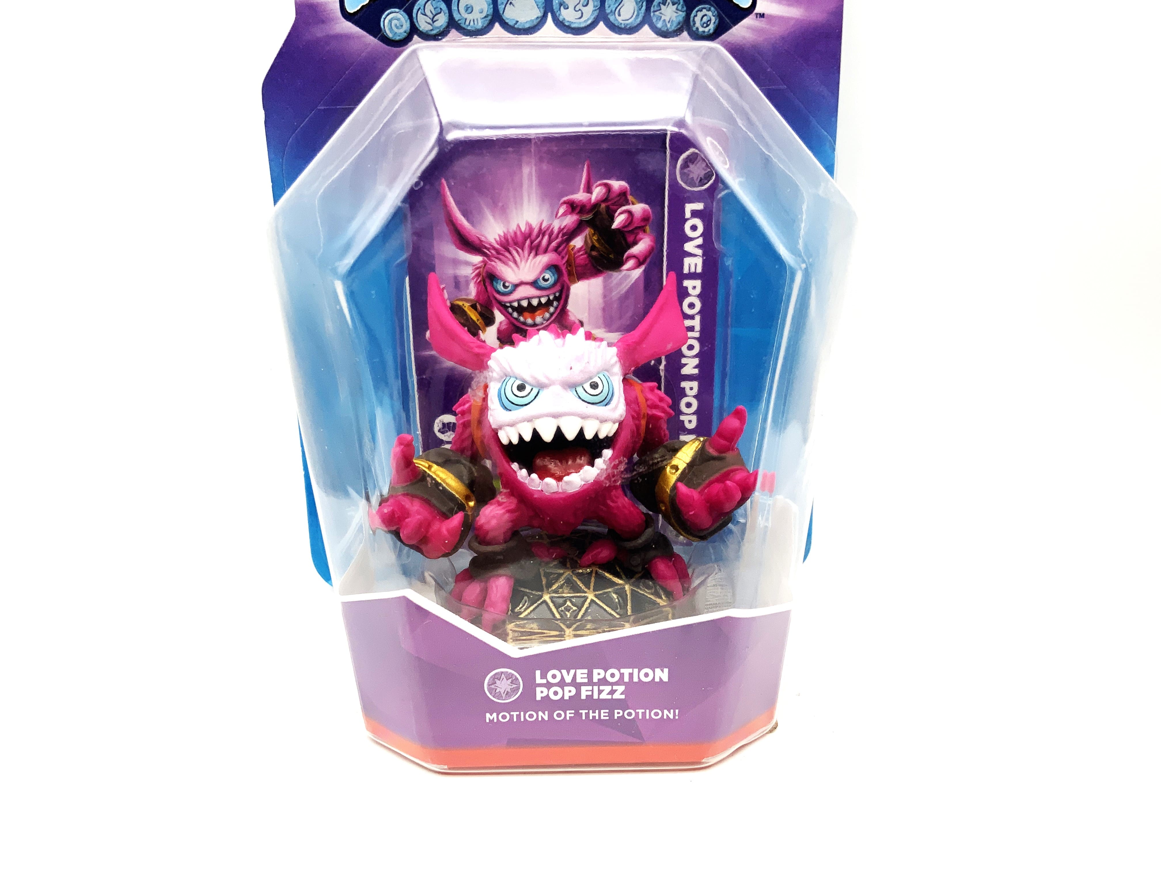 Figurine Skylanders Trap Team Love Potion Pop Fizz dans son emballage d'origine OVP